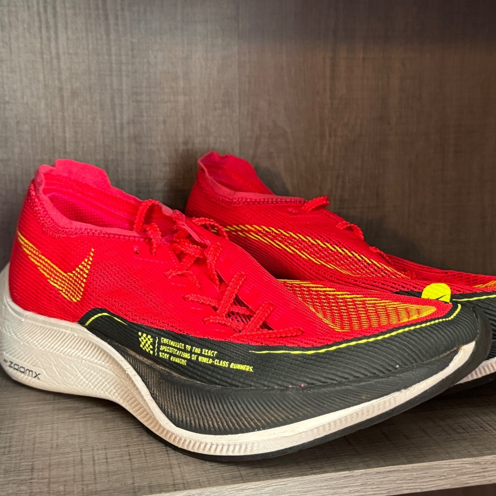 Nike Men’s Red and Black Athletic Running Shoes with Yellow Accents
